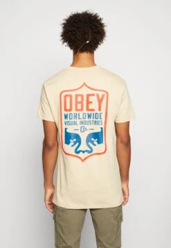 Obey Clothing Visual Badge - Print T-Shirt - Sand